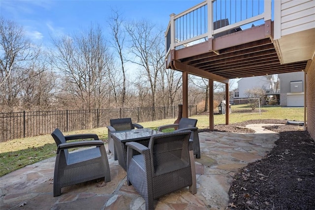 view of patio with outdoor dining area and a fenced backyard