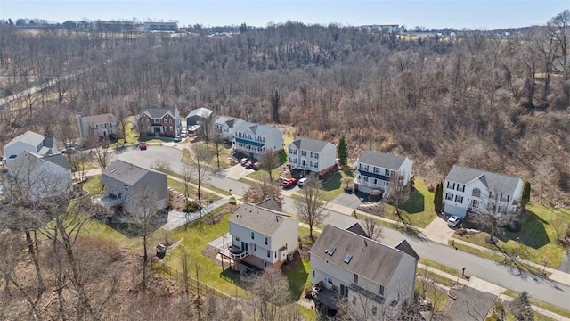 bird's eye view with a residential view and a view of trees