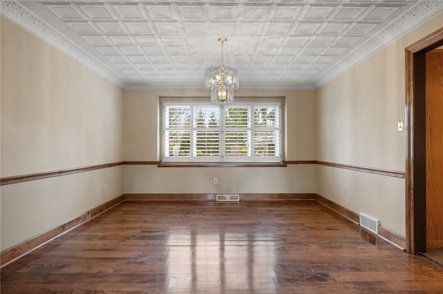 unfurnished dining area with visible vents, an ornate ceiling, and an inviting chandelier