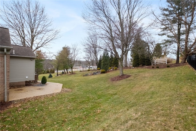 view of yard with fence