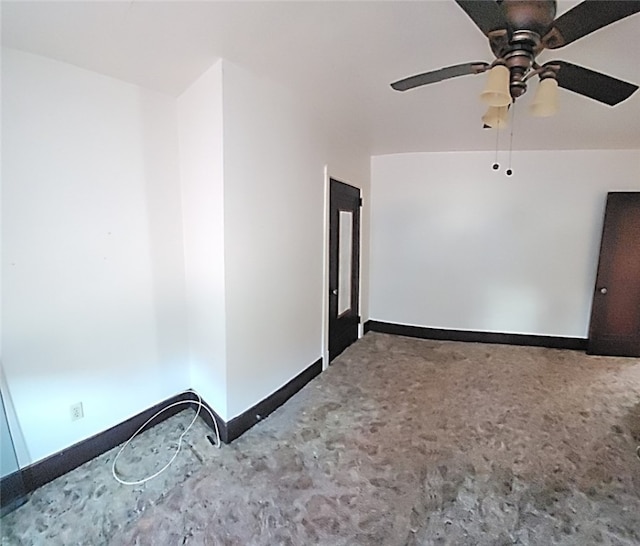 empty room with baseboards, carpet, and a ceiling fan