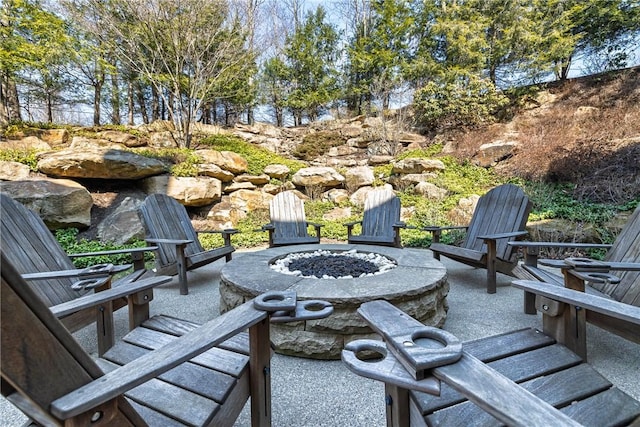 view of patio / terrace with a fire pit