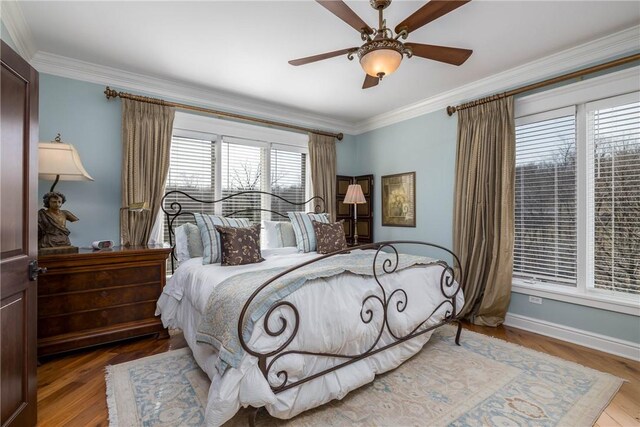 29 Virginia Ln, Cecil, PA 15317 - bedroom with ornamental molding, wood finished floors, and a ceiling fan