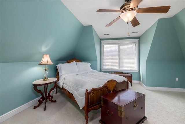 bedroom with visible vents, carpet flooring, baseboards, ceiling fan, and vaulted ceiling