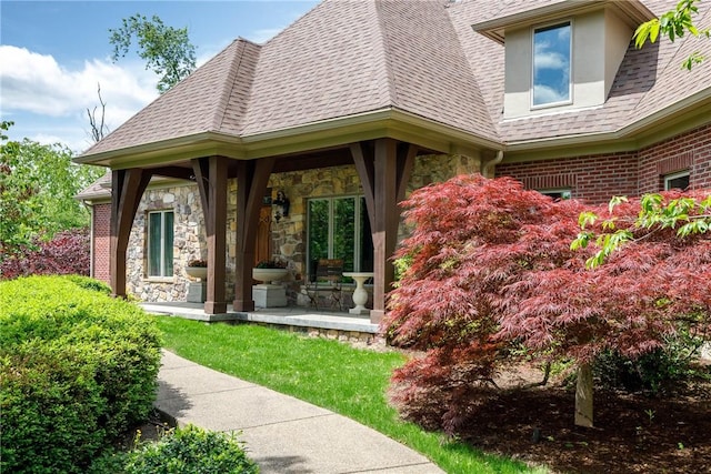 29 Virginia Ln, Cecil, PA 15317 - doorway to property with stone siding and roof with shingles