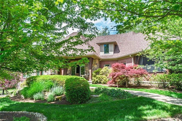 29 Virginia Ln, Cecil, PA 15317 - view of front of house with stone siding, a shingled roof, and a front lawn