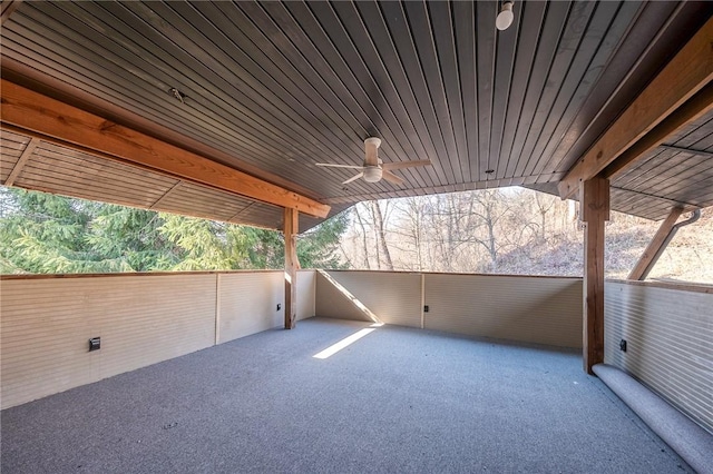 view of patio with a balcony and a ceiling fan