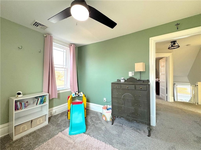 rec room featuring visible vents, carpet floors, baseboards, and ceiling fan