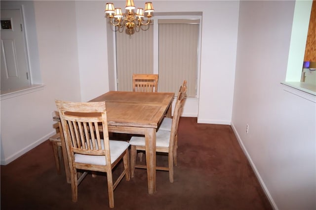 dining area with baseboards and an inviting chandelier