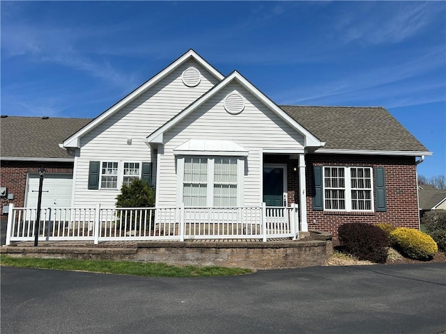 6233 Oyster Bay Ct, South Fayette, PA 15017 - ranch-style house with a garage, brick siding, and roof with shingles