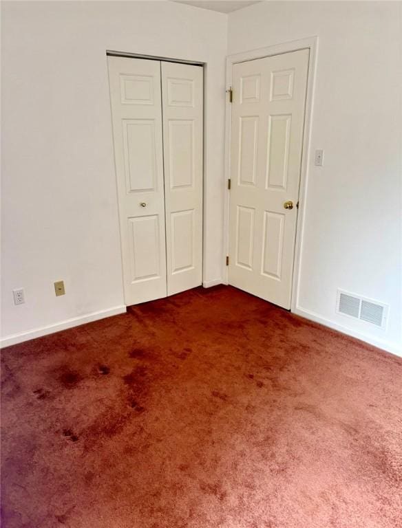 6233 Oyster Bay Ct, South Fayette, PA 15017 - unfurnished bedroom with dark carpet, a closet, and baseboards