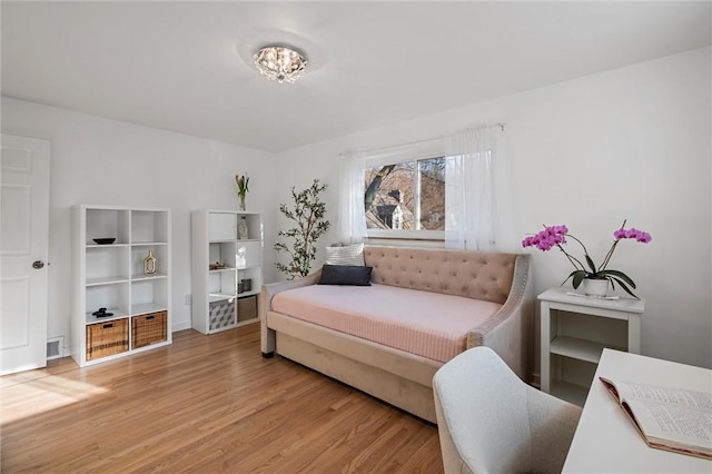 bedroom featuring wood finished floors