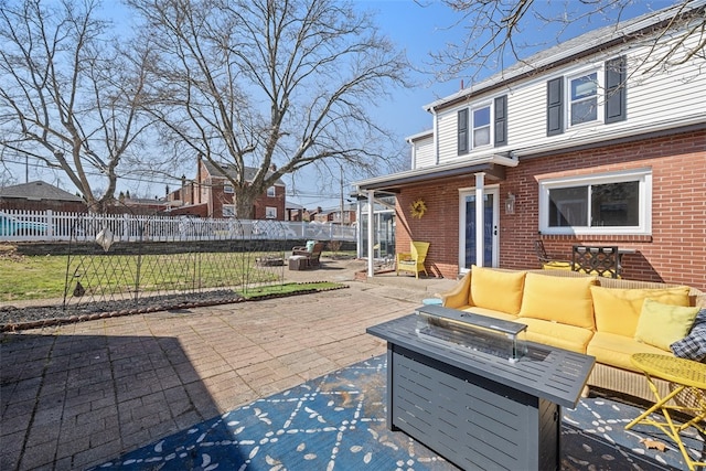 view of patio featuring an outdoor living space and fence private yard