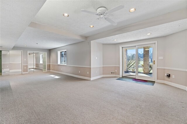 empty room with recessed lighting, baseboards, and carpet floors