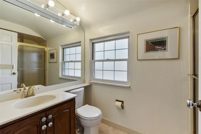 full bath with vanity, baseboards, tile patterned flooring, toilet, and a shower with door