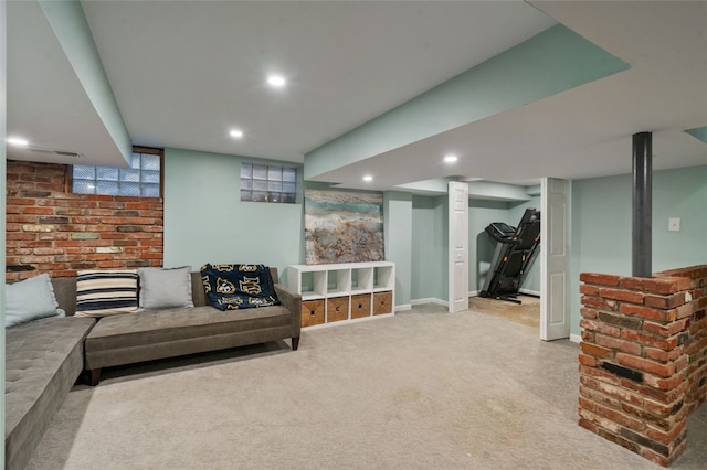 carpeted living room with recessed lighting and baseboards