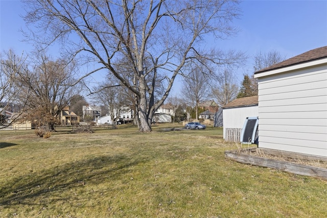 view of yard featuring a residential view