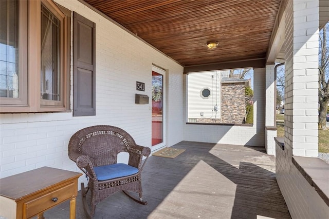 wooden terrace with covered porch