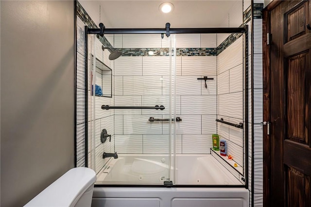 bathroom with combined bath / shower with glass door and toilet