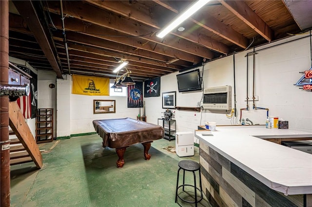 game room featuring heating unit, concrete floors, and billiards