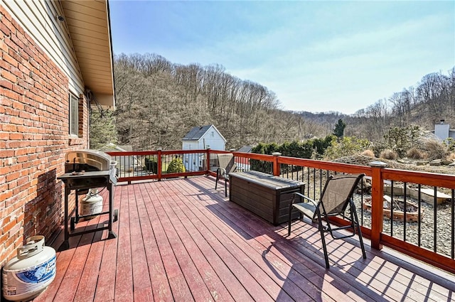 wooden deck with an outbuilding