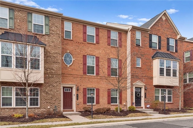 multi unit property featuring brick siding