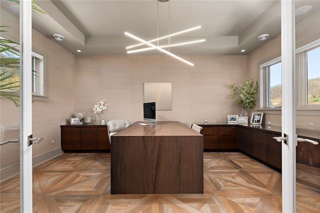 office area with french doors, baseboards, and a notable chandelier