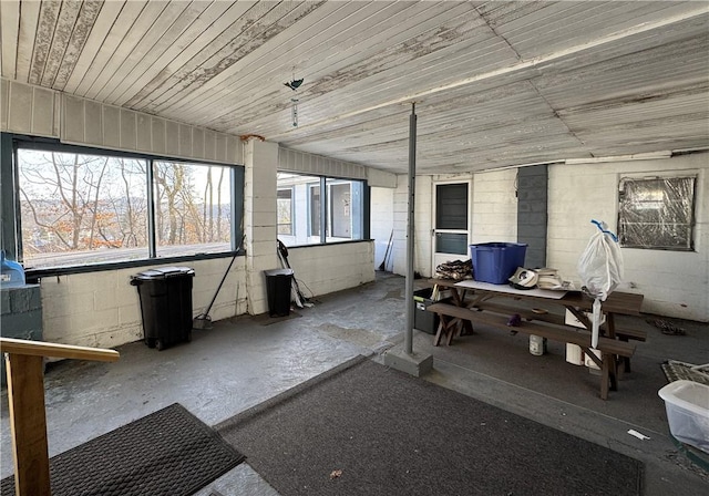 sunroom / solarium with wood ceiling