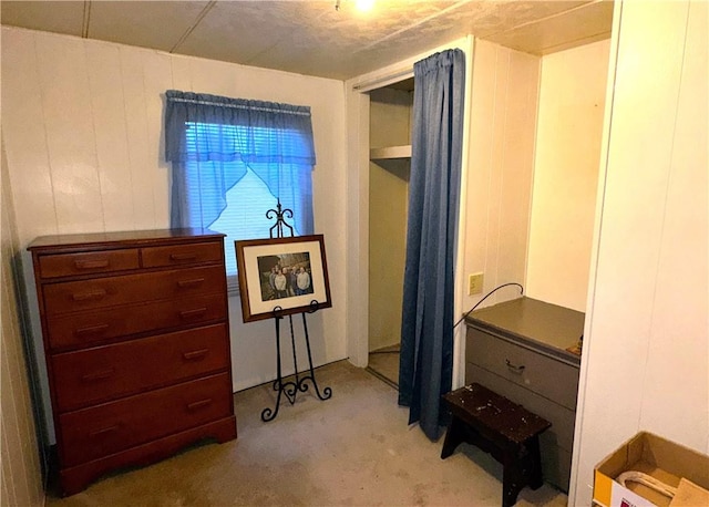 bedroom with light colored carpet