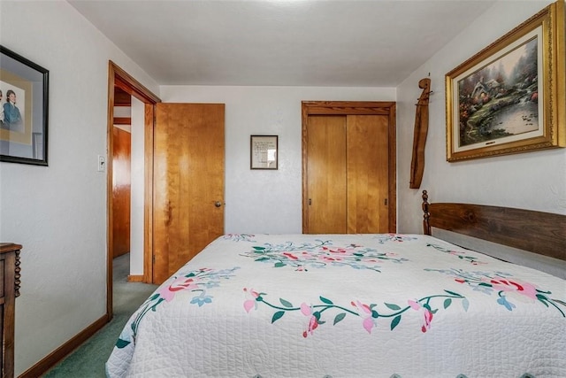 bedroom featuring a closet, carpet floors, and baseboards