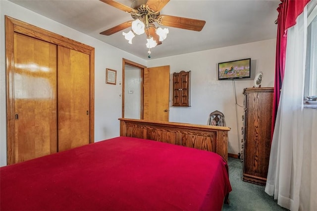 carpeted bedroom featuring a closet and ceiling fan