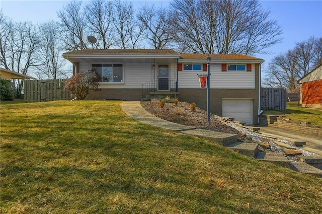 ranch-style home featuring a front lawn, fence, a garage, and driveway