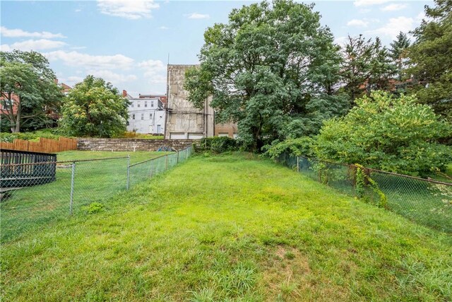 view of yard with fence