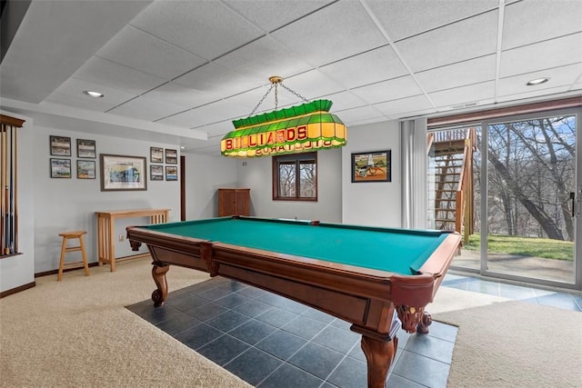 playroom featuring a wealth of natural light, a drop ceiling, and carpet