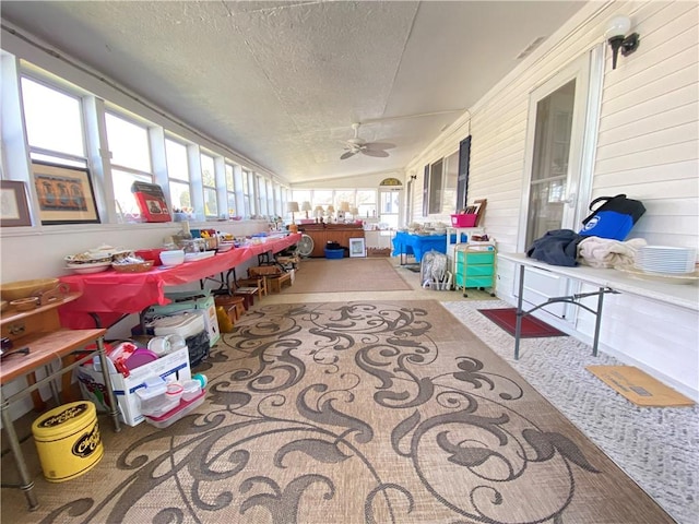 sunroom / solarium with lofted ceiling