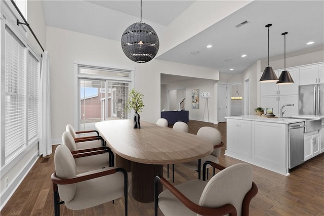 dining area featuring dark wood finished floors, recessed lighting, visible vents, and baseboards