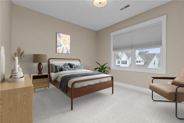 bedroom with visible vents, light colored carpet, and baseboards