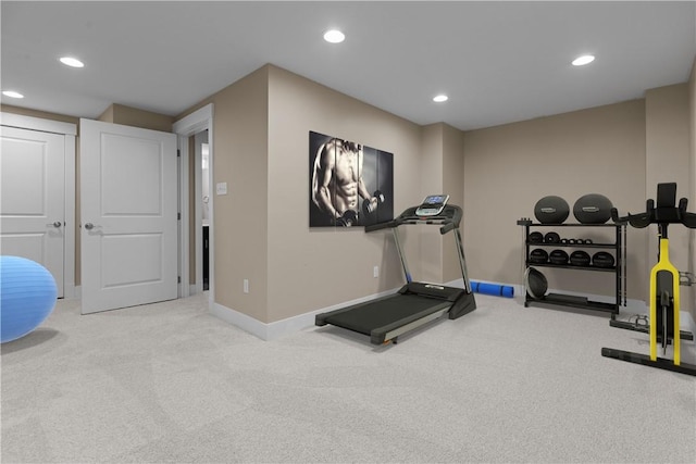 exercise area featuring recessed lighting, baseboards, and carpet floors