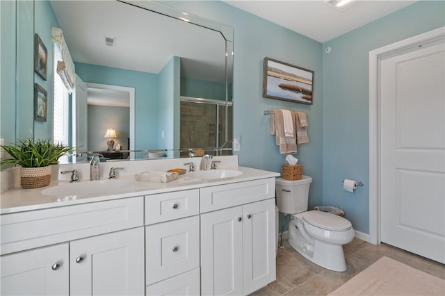 full bathroom with a sink, visible vents, toilet, and a shower stall