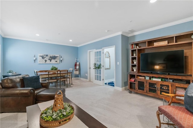 carpeted living area with recessed lighting, crown molding, and baseboards