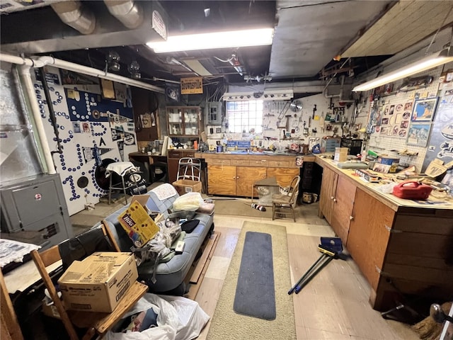 basement with a workshop area