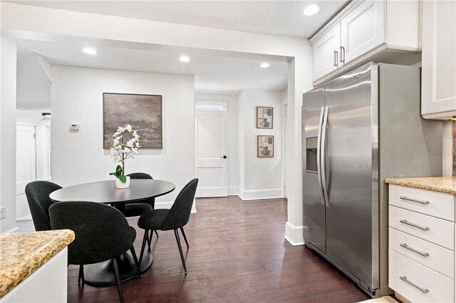 dining area featuring recessed lighting, baseboards, and dark wood-style floors