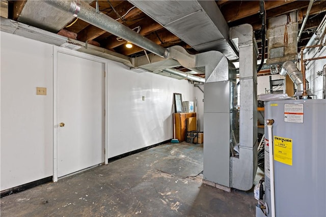 unfinished basement featuring gas water heater, heating unit, and baseboards