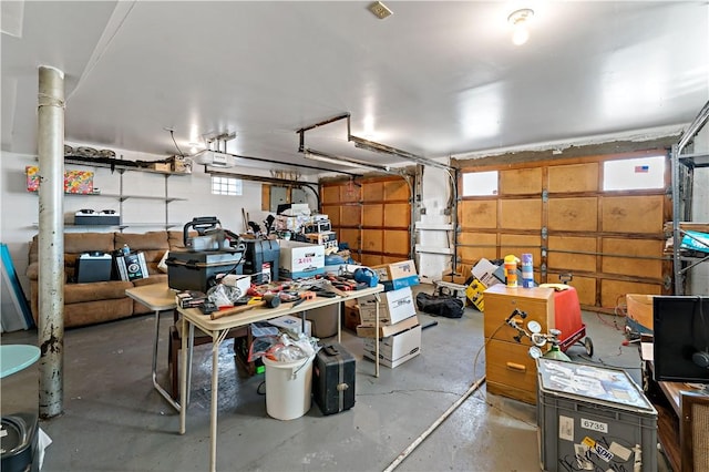 garage featuring a garage door opener