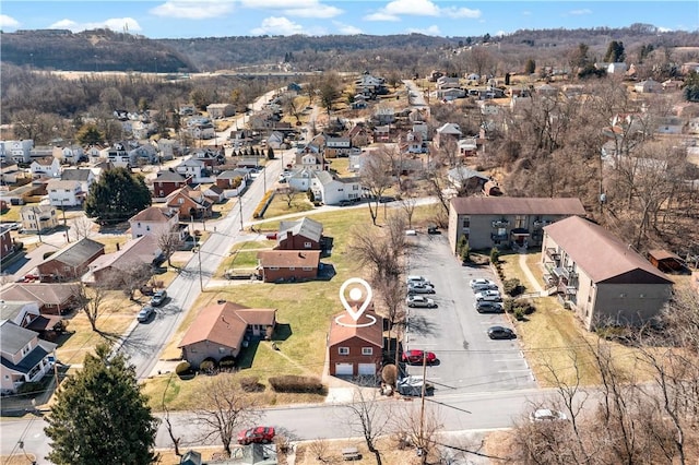 birds eye view of property with a residential view