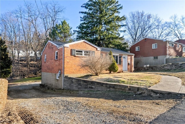 view of front facade featuring brick siding