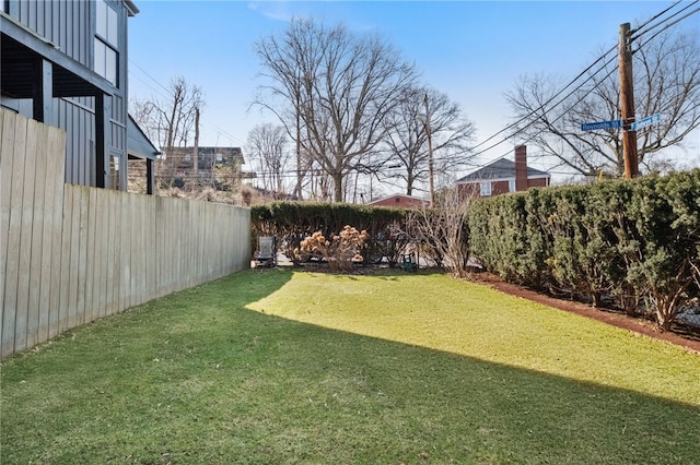 view of yard featuring a fenced backyard