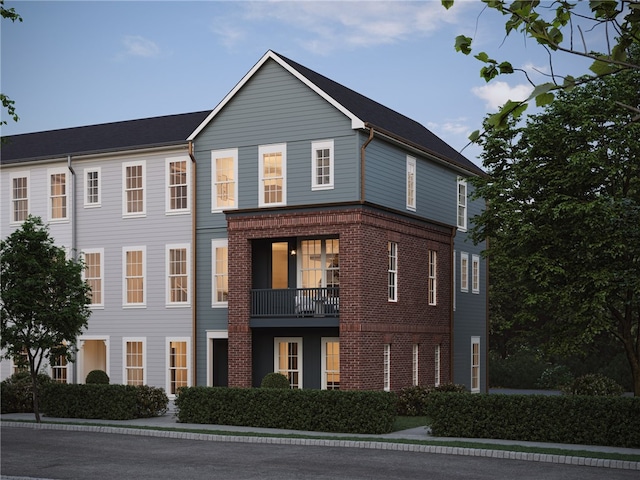 view of front facade featuring brick siding