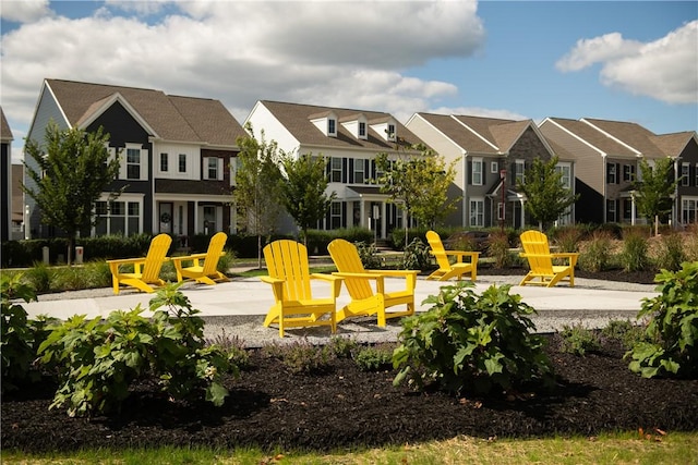 exterior space featuring a patio area and a residential view