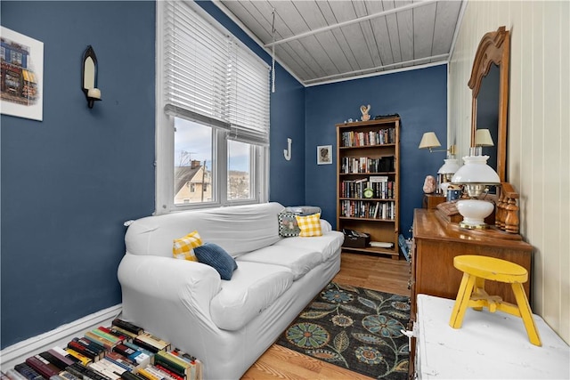 interior space featuring wooden ceiling and wood finished floors